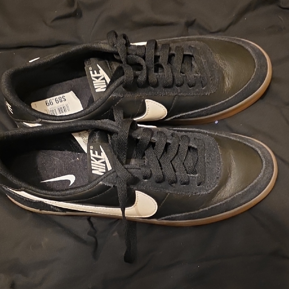 Nike Black Low-Top Sneakers with White Swoosh and Gum Sole